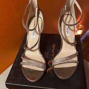 Bronze heel open toe.Size 11